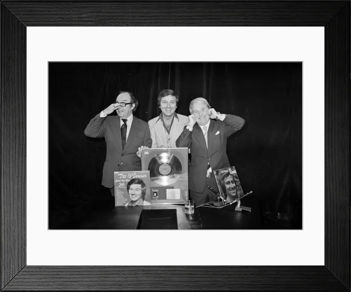 Framed Print : Morecambe and Wise present Des O Connor with a golden disc to mark 100000 sales of