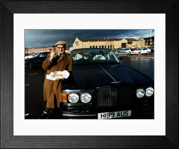 Framed Print : Gerald Weisfeld former boss of What Every Woman Wants shops eating fish Framed Print : Gerald Weisfeld former boss of What Every Woman Wants shops eating fish