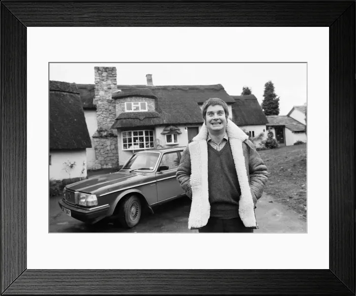 Framed Print : Black Sabbath singer Ozzy Osbourne pictured outside his new house, beside his Volvo car Framed Print : Black Sabbath singer Ozzy Osbourne pictured outside his new house, beside his Volvo car