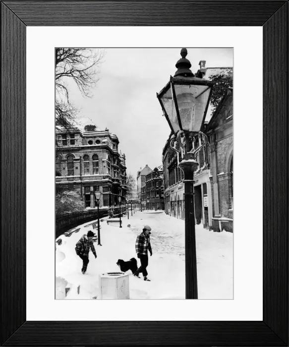 Framed Print : Pedestrians walking dog through the near deserted streets Cardiff, Wales Framed Print : Pedestrians walking dog through the near deserted streets Cardiff, Wales