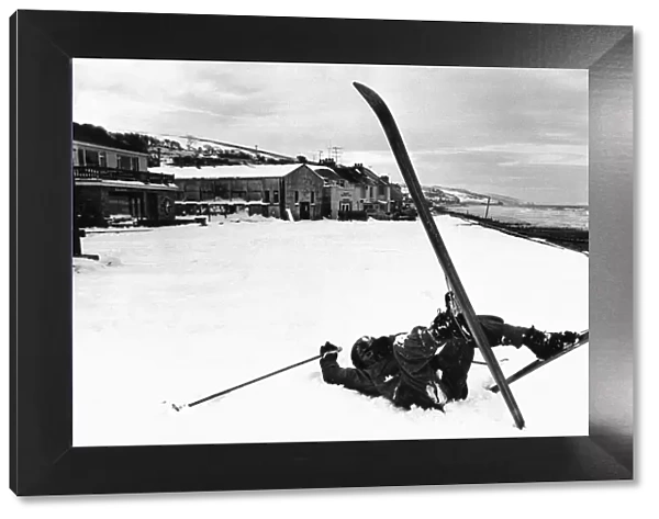 Skier takes a tumble on the beach at Amroth, Pembrokeshire, West Wales