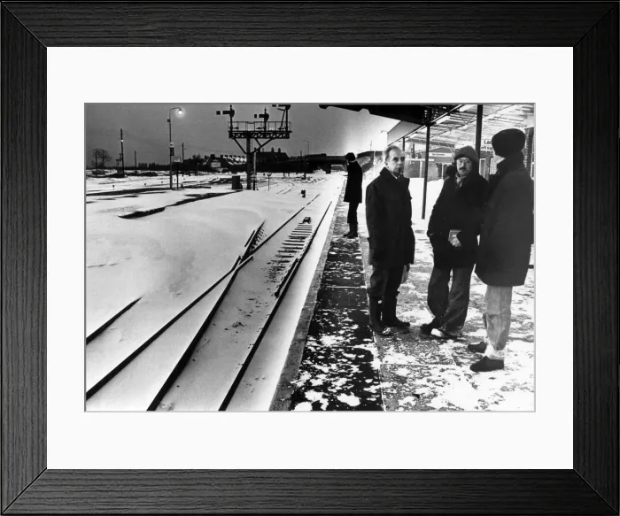Framed Print : Early morning workers wait at Barry Station for a train Framed Print : Early morning workers wait at Barry Station for a train