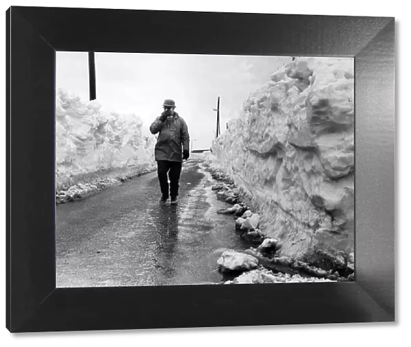 Walles of solid snow, taller than the average man, leading into Llantwit Major