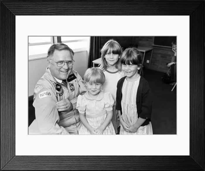 Framed Print : All smiles as these three Huddersfield youngsters come face-to-face with a real spaceman