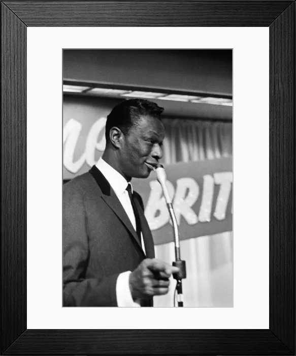 Framed Print : Nat King Cole, American singer, and pianist performing in London