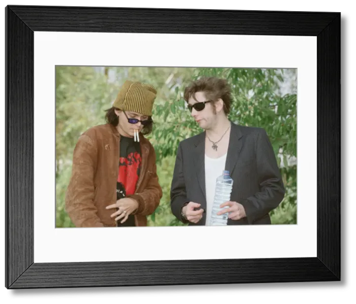 Framed Print : Johnny Depp (left in the hat) and singer Shane MacGowan Framed Print : Johnny Depp (left in the hat) and singer Shane MacGowan