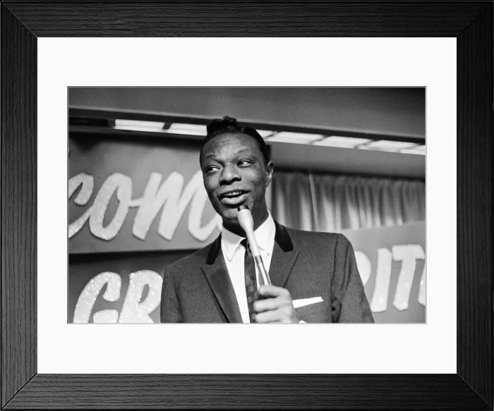 Framed Print : Nat King Cole, American singer, and pianist performing in London