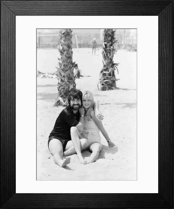 Framed Print : Keith Moon, drummer of The Who rock group with model Annette Lax in the resort of Malibu