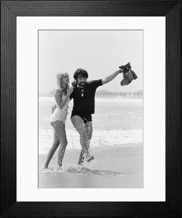 Framed Print : Keith Moon, drummer of The Who rock group with model Annette Lax in the resort of Malibu Framed Print : Keith Moon, drummer of The Who rock group with model Annette Lax in the resort of Malibu