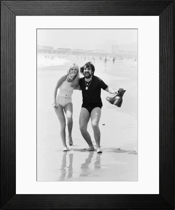Framed Print : Keith Moon, drummer of The Who rock group with model Annette Lax in the resort of Malibu