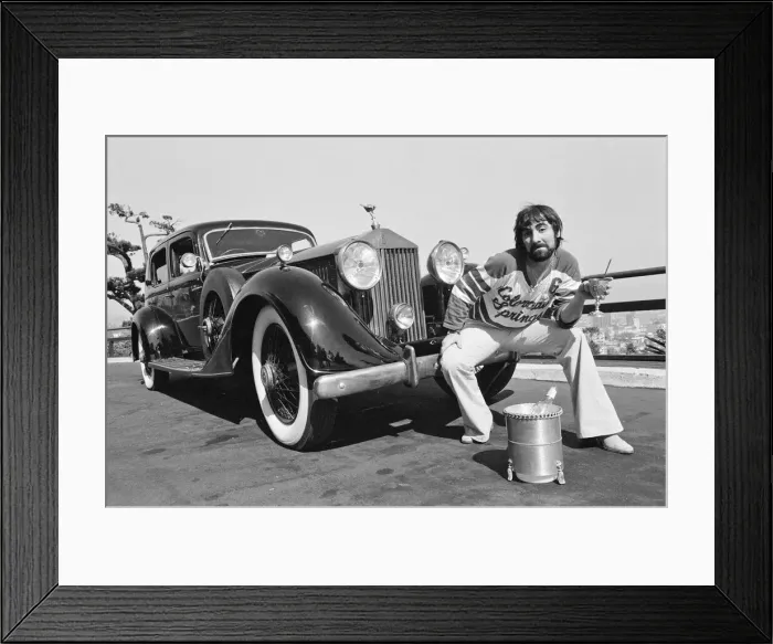 Framed Print : Keith Moon, drummer of The Who rock group, with his 1929 built Rolls Royce car in Framed Print : Keith Moon, drummer of The Who rock group, with his 1929 built Rolls Royce car in