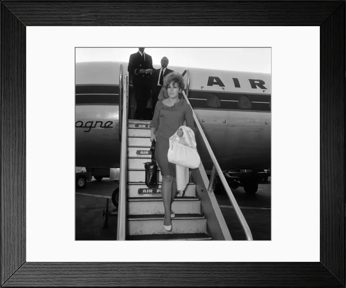 Framed Print : Kim Novak arrives at LAP on her return to this country from America. 13th August 1965
