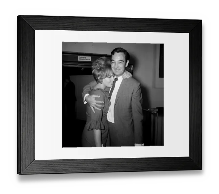 Framed Print : Richard Johnson at London Airport meeting his wife Kim Novak on her return to this Framed Print : Richard Johnson at London Airport meeting his wife Kim Novak on her return to this