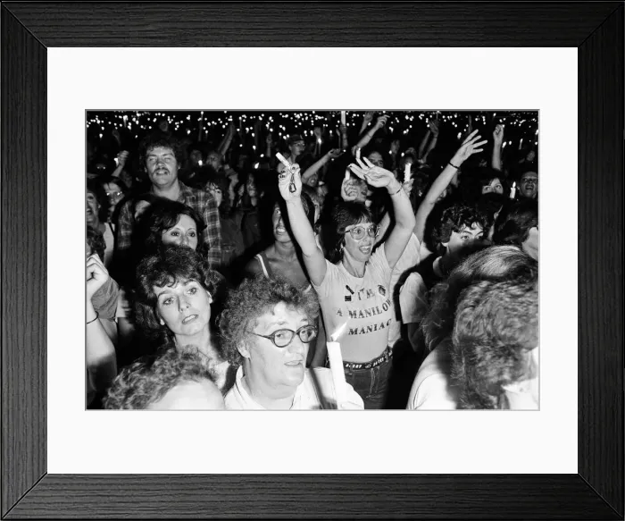 Framed Print : Barry Manilow fans watching him in concert at Blenhiem Palace