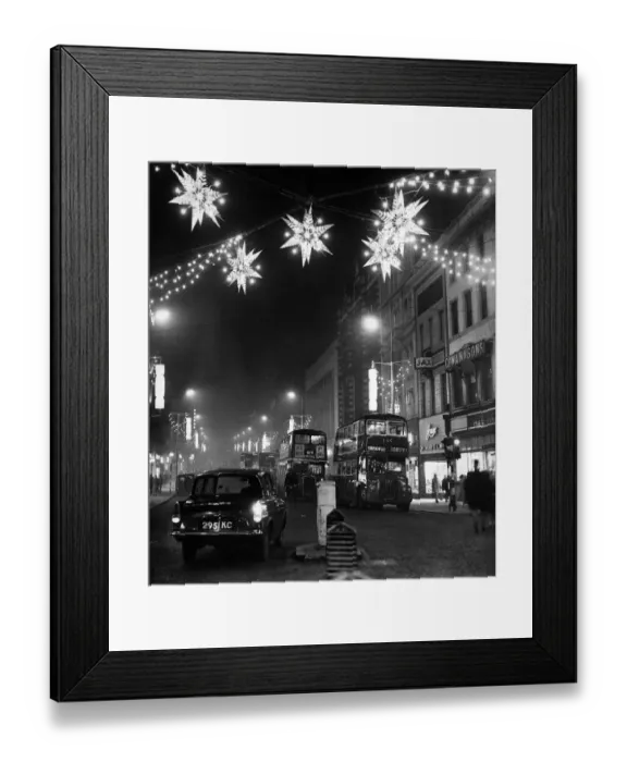 Framed Print : Lord Street, christmas lights stretch away uphill from the junction with Paradise Street