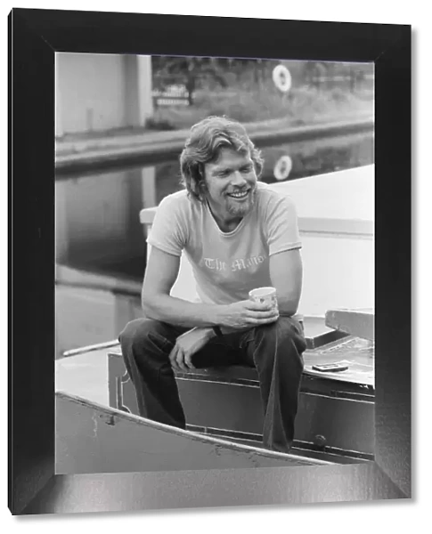 Richard Branson, 28 year old mastermind behind Virgin Music company. Relaxing on his boat