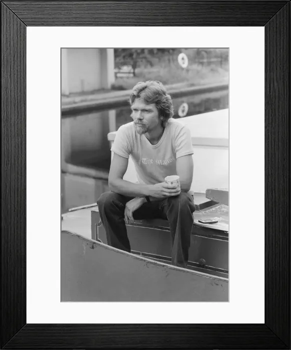 Framed Print : Richard Branson, 28 year old mastermind behind Virgin Music company. Relaxing on his boat Framed Print : Richard Branson, 28 year old mastermind behind Virgin Music company. Relaxing on his boat