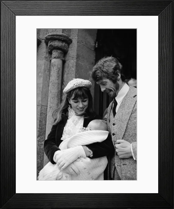 Framed Print : Actor Michael Crawford and his wife Gabrielle at the christening of their second daughter
