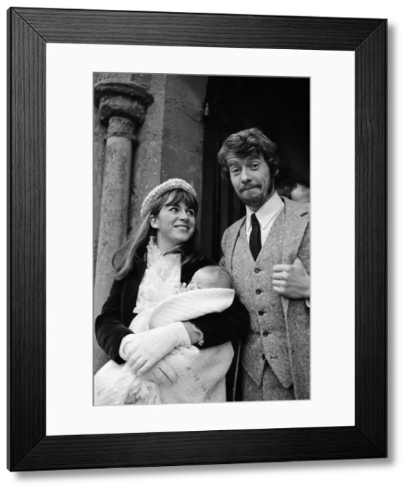 Framed Print : Actor Michael Crawford and his wife Gabrielle at the christening of their second daughter Framed Print : Actor Michael Crawford and his wife Gabrielle at the christening of their second daughter