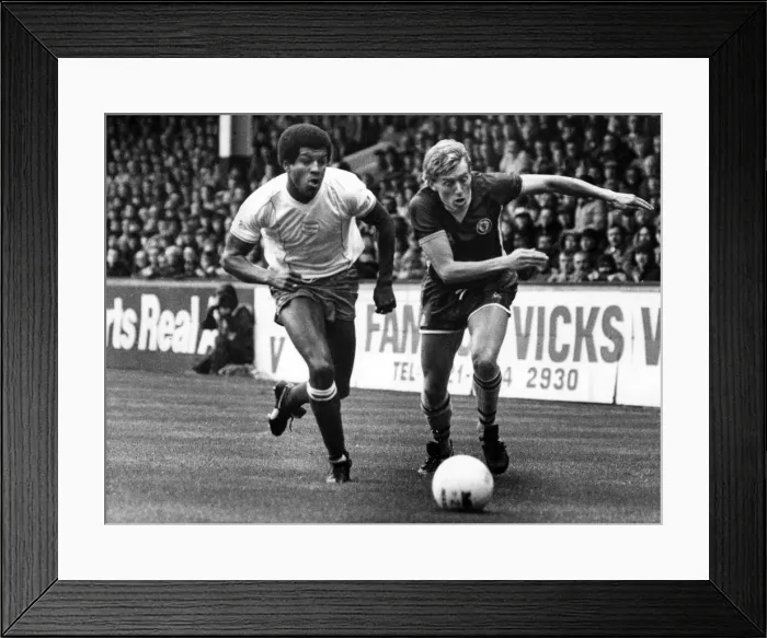 Framed Print : The chase is on, Villas Tony Morley and Blues Howard Gayle give chase at Villa
