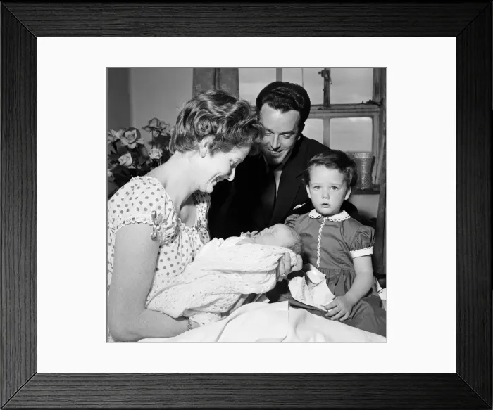 Framed Print : 3-year-old Louisa, daughter of Brian Rix and Elspet Gray, meets her new baby brother Framed Print : 3-year-old Louisa, daughter of Brian Rix and Elspet Gray, meets her new baby brother