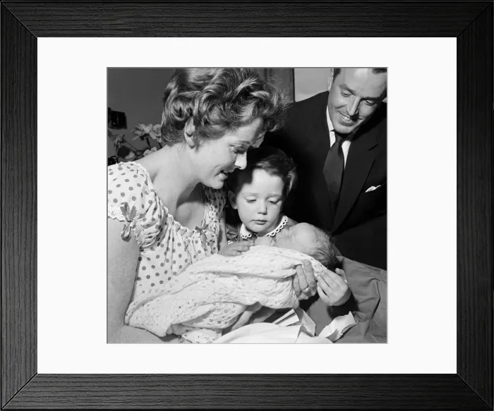 Framed Print : 3-year-old Louisa, daughter of Brian Rix and Elspet Gray, meets her new baby brother Framed Print : 3-year-old Louisa, daughter of Brian Rix and Elspet Gray, meets her new baby brother