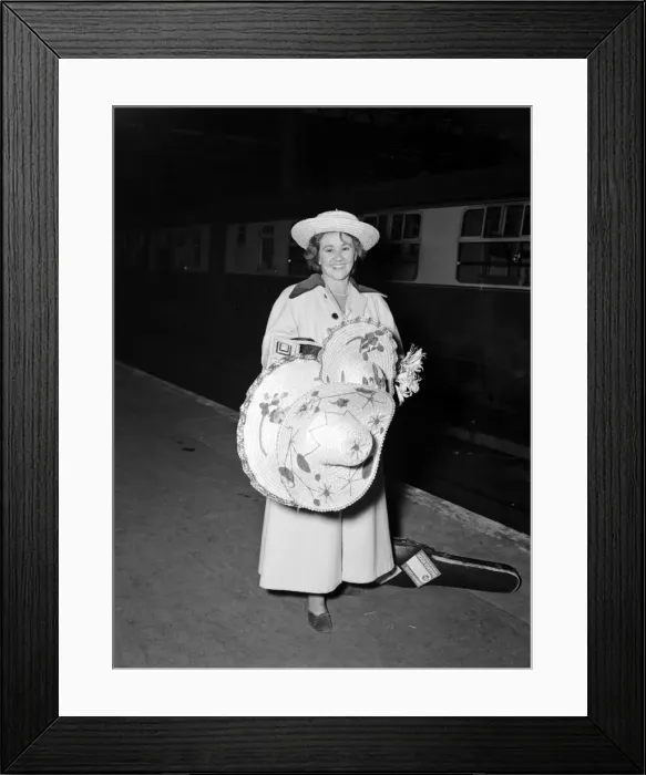 Framed Print : Actress Joan Plowright and her husband return from SAF. 3rd October 1952 Framed Print : Actress Joan Plowright and her husband return from SAF. 3rd October 1952
