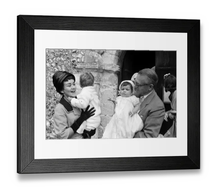 Framed Print : Laurence Olivier and Joan Plowright attend the Christening of their daughter Tamsin