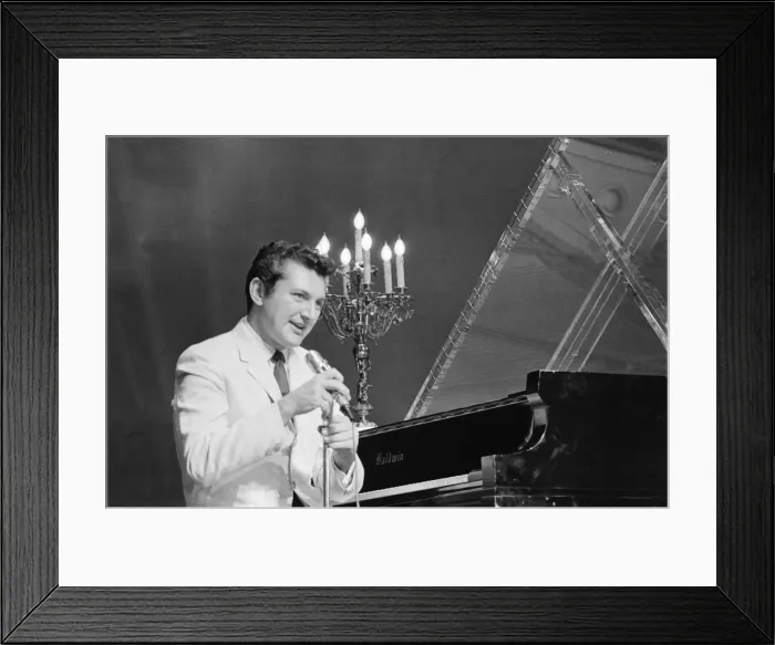 Framed Print : Liberace entertains the audience at The Royal Variety Show held in the presence of her Framed Print : Liberace entertains the audience at The Royal Variety Show held in the presence of her