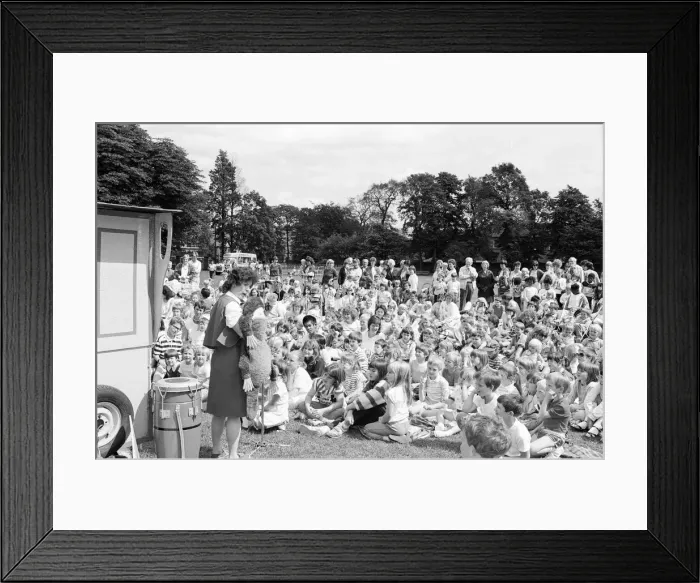 Framed Print : Riveting Huddersfield children flocked to see a puppet show at Ravensknowle Park