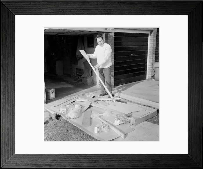 Framed Print : Mr Larry Cooper has just received a kit of parts to build a Mirror'dinghy Framed Print : Mr Larry Cooper has just received a kit of parts to build a Mirror'dinghy