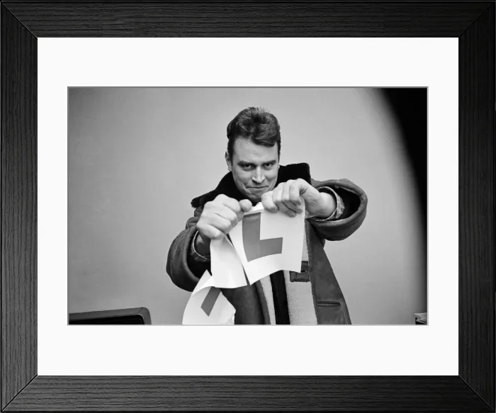 Framed Print : Actor Brian Blessed, pictured tearing up his L plates, as he has just passed his driving Framed Print : Actor Brian Blessed, pictured tearing up his L plates, as he has just passed his driving