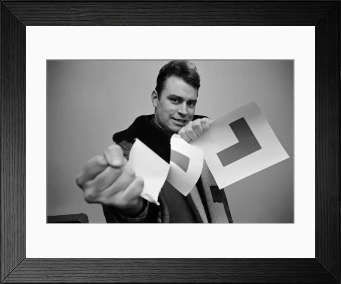 Framed Print : Actor Brian Blessed, pictured tearing up his L plates, as he has just passed his driving Framed Print : Actor Brian Blessed, pictured tearing up his L plates, as he has just passed his driving