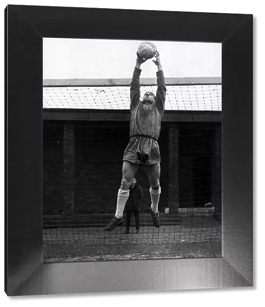 Ronnie Simpson goalkeeper jumping to catch football at goalmouth Circa 1967
