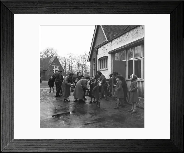 Framed Print : Parents collecting their children from school. 6th December 1957
