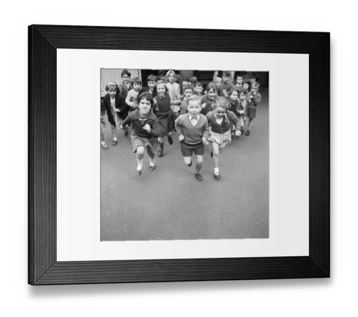 Framed Print : After a morning of Maths and English the pupils of Christopher Hatton Primary can