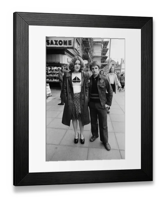 Framed Print : Football supporters on their way to a match. October 1972