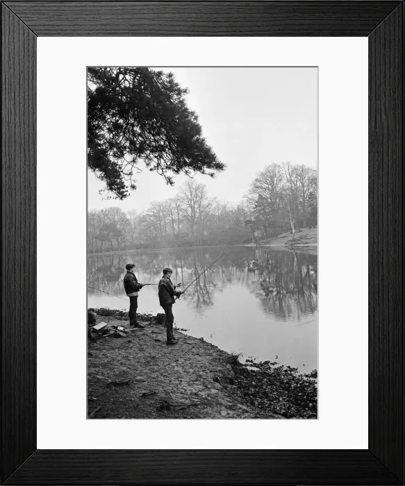 Framed Print : Scenes of boys fishing at Keston Ponds, Kent. 9th January 1964