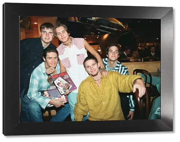 Photo shows from left to right Gary Barlow, Howard Donald, Mark Owen