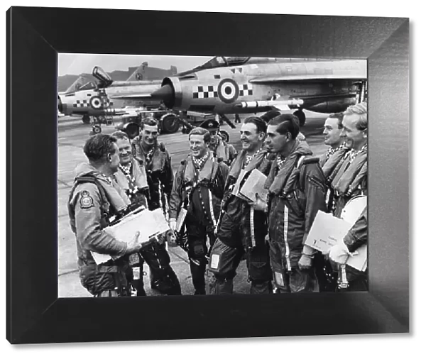 Wing commander Bryan Cox (left) commanding officer of 19 Lightning Squadron gives a final