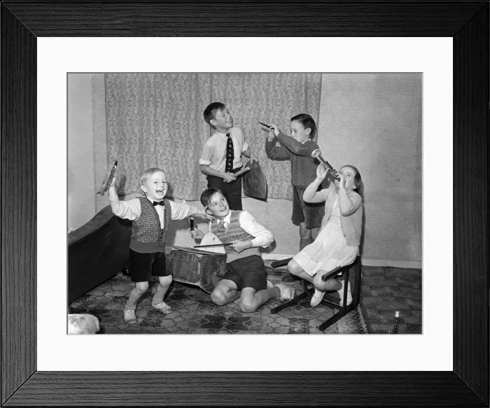 Framed Print : A young skiffle group playing their instruments. Left to right in front, Leslie Bennett Framed Print : A young skiffle group playing their instruments. Left to right in front, Leslie Bennett