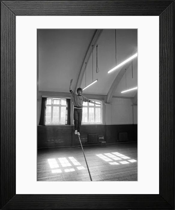 Framed Print : Actor Michael Crawford works out on the high wire. 8th April 1981 Framed Print : Actor Michael Crawford works out on the high wire. 8th April 1981