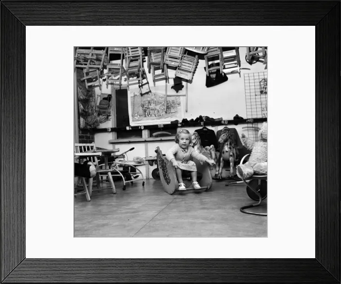 Framed Print : Margaret, aged 2 and a half, starts nursery school. She is the only one of 30 pupils Framed Print : Margaret, aged 2 and a half, starts nursery school. She is the only one of 30 pupils