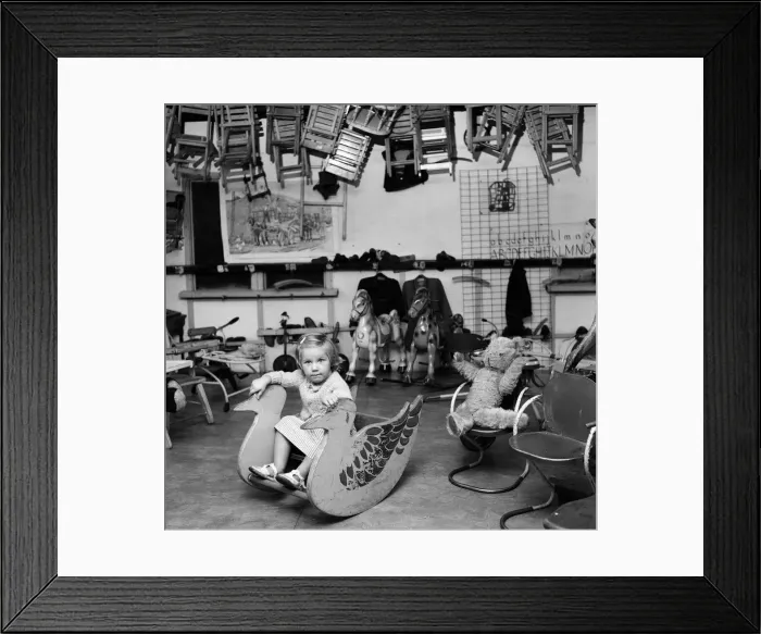 Framed Print : Margaret, aged 2 and a half, starts nursery school. She is the only one of 30 pupils Framed Print : Margaret, aged 2 and a half, starts nursery school. She is the only one of 30 pupils