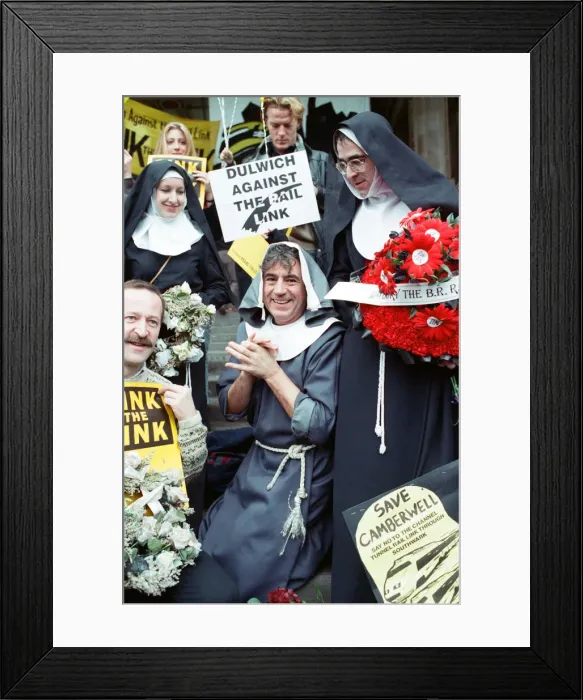 Framed Print : Comedian and actor Terry Jones takes part in a rail tunnel protest outside Waterloo Framed Print : Comedian and actor Terry Jones takes part in a rail tunnel protest outside Waterloo