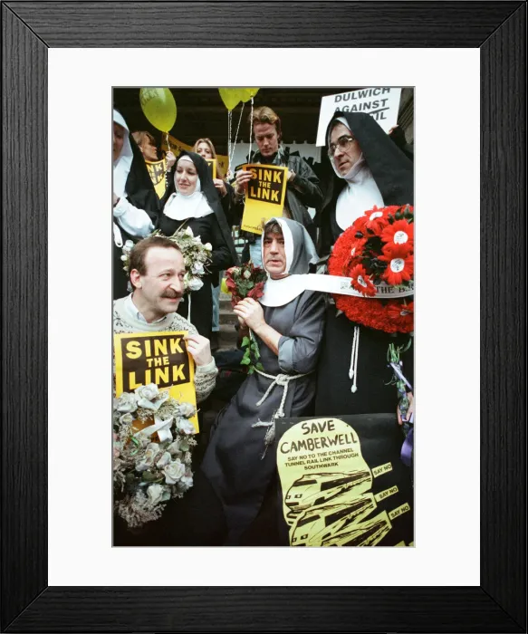 Framed Print : Comedian and actor Terry Jones takes part in a rail tunnel protest outside Waterloo Framed Print : Comedian and actor Terry Jones takes part in a rail tunnel protest outside Waterloo