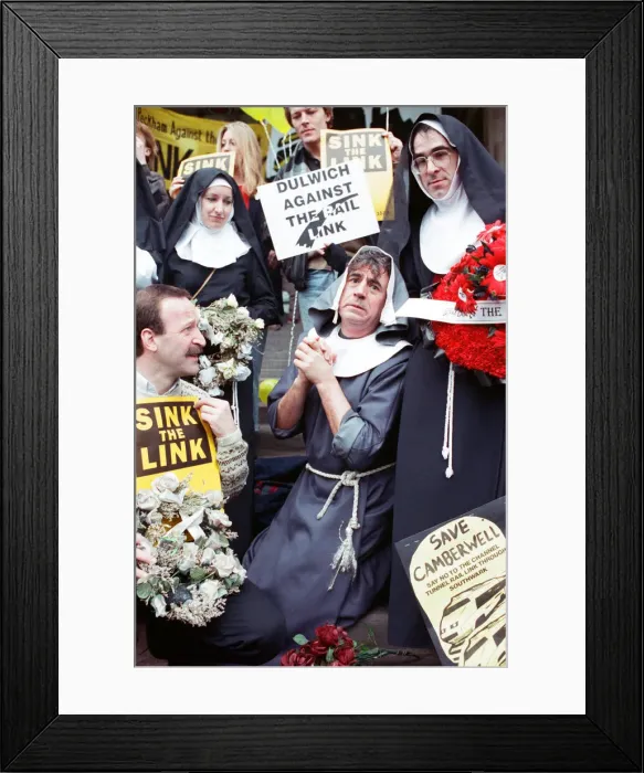 Framed Print : Comedian and actor Terry Jones takes part in a rail tunnel protest outside Waterloo Framed Print : Comedian and actor Terry Jones takes part in a rail tunnel protest outside Waterloo
