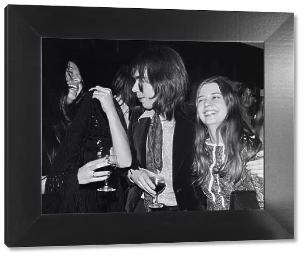 Photo shows from left to right, Lady laughing Unknown, Andrew Lloyd Webber