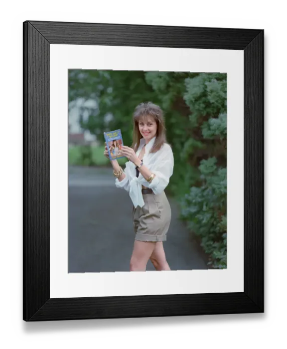 Framed Print : Television Presenter Carol Vorderman posing with her book Dirty Framed Print : Television Presenter Carol Vorderman posing with her book Dirty