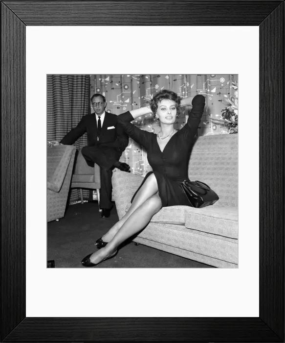 Framed Print : Sophia Loren pictured sitting in a chair at London Airport Framed Print : Sophia Loren pictured sitting in a chair at London Airport
